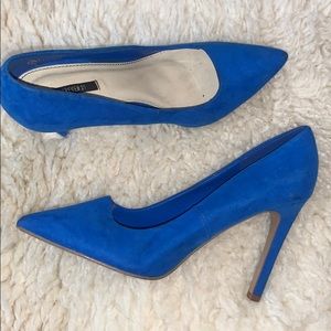 Blue suede pumps